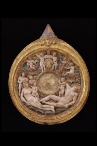 After Antonio Pollaioulo<br />Mirror frame in the form of the Medici ring, c. 1470–80<br />Painted and gilded stucco in a gilt wood frame, 64.2 x 50.8 x 5.5 cm (25 1/4 x 20 x 2 1/5 in.)<br />Victoria and Albert Museum, London
